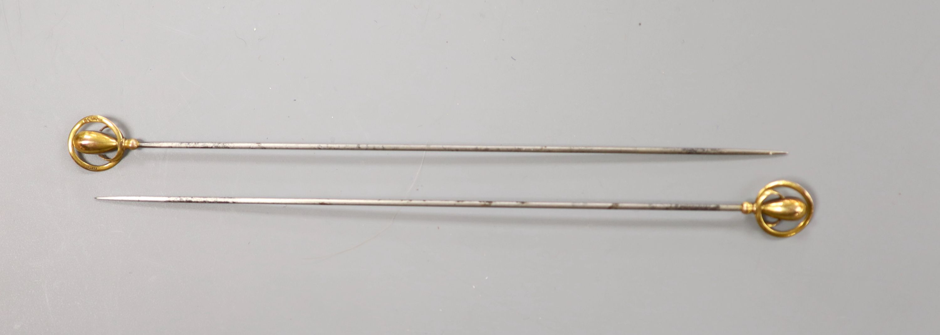 A pair of Charles Hornet 9ct gold mounted hat pins, 16.6cm.